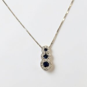 Collana in oro con diamanti e zaffiri