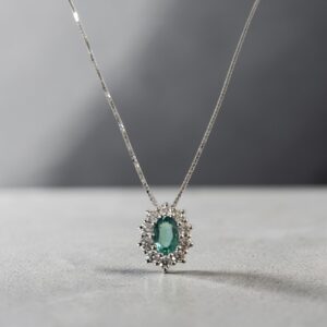 Collana in oro 18kt con diamanti e smeraldi