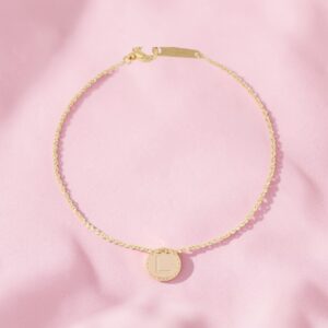 Bracciale in oro 18kt con medaglia lettera L