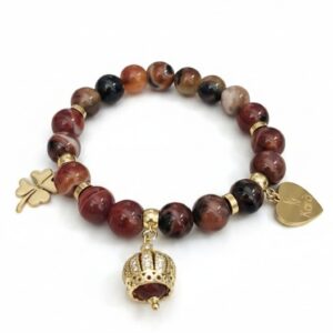 Bracciale Elastico in Corniola striata con Charme dorati e corona